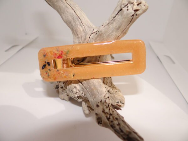 Barrette orange avec fleurs