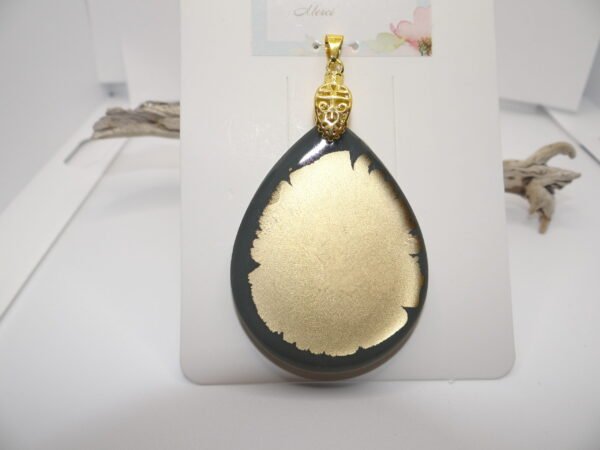 Pendentif doré et gris