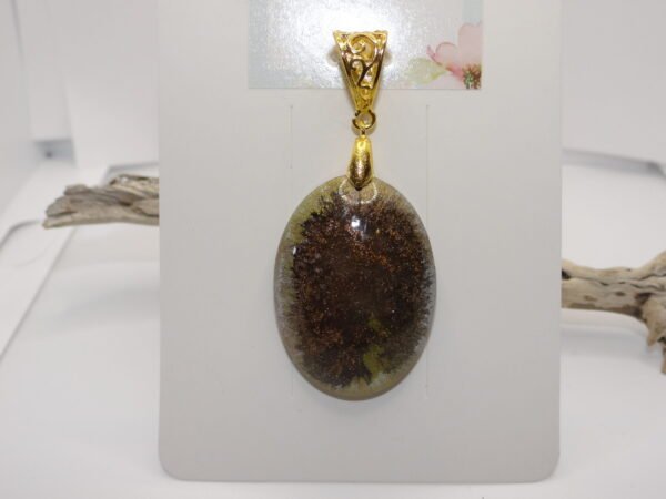 Pendentif ovale marron et transparent